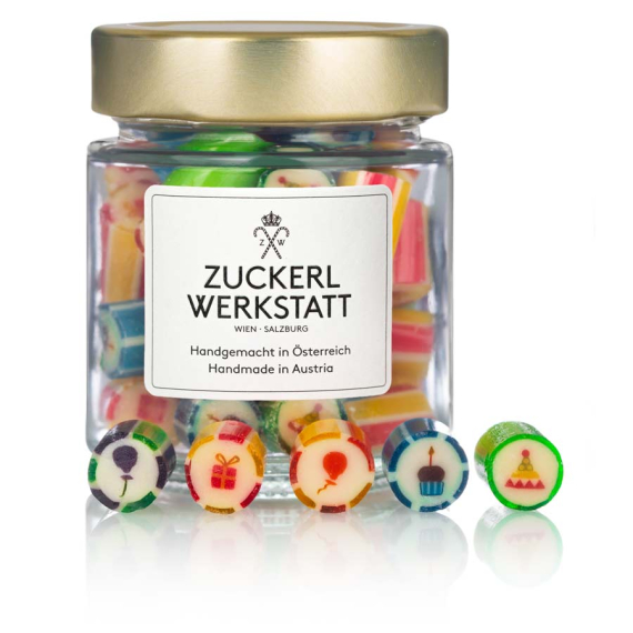 Bonbons mit Motiven passend zum Geburtstag wie Luftballon, Muffin und Geschenk
