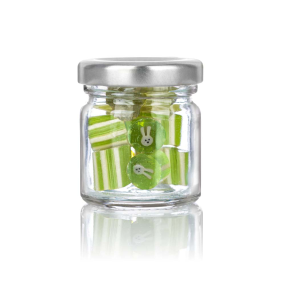 Grünes Bonbon mit grauem Osterhasenmotiv