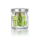 Grünes Bonbon mit grauem Osterhasenmotiv